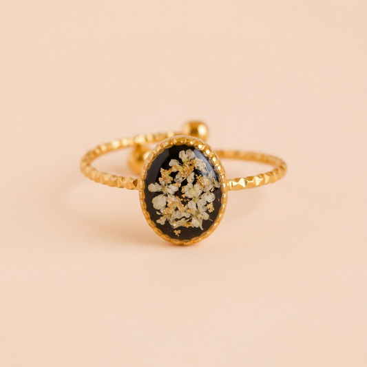 The Black Lyla Ring - Gold Oval Ring with White Preserved Flowers on Black Background | 18k Gold Plated Brass Jewelry